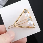 zlatý perlový trojúhelník
